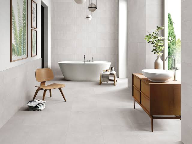 Large format stone-look porcelain tile in a luxury bathroom